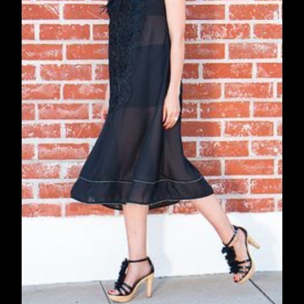 Wooden heels with fabric embellishment